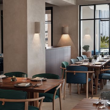 a restaurant with tables and chairs