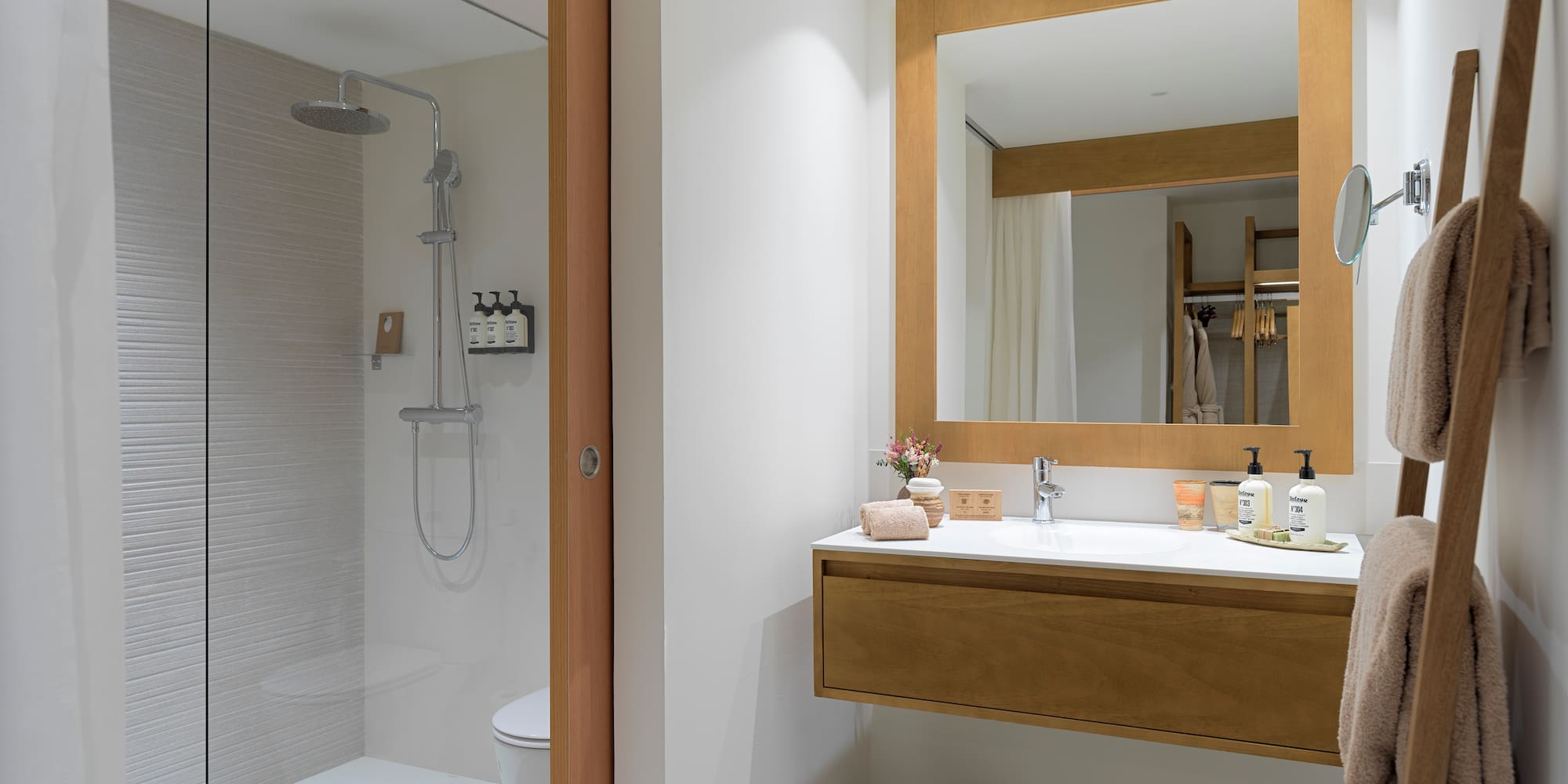 a bathroom with a shower and a sink