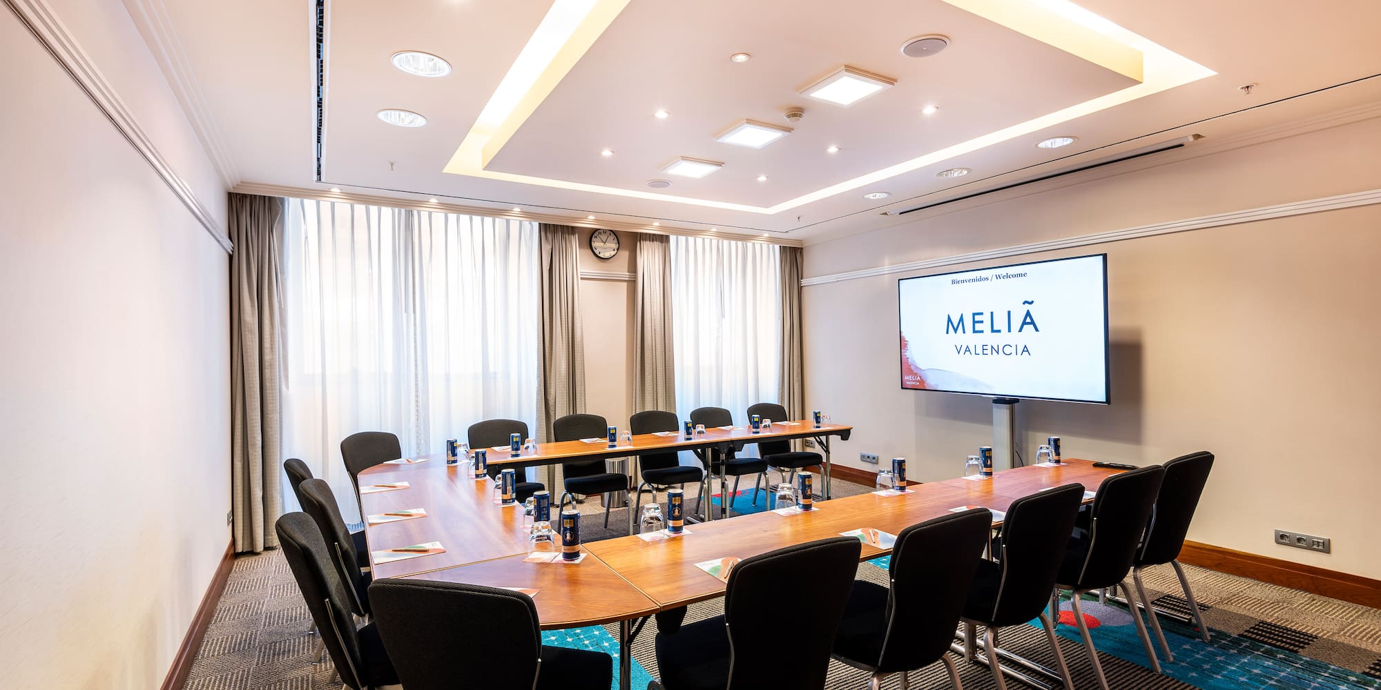 a room with a table and chairs