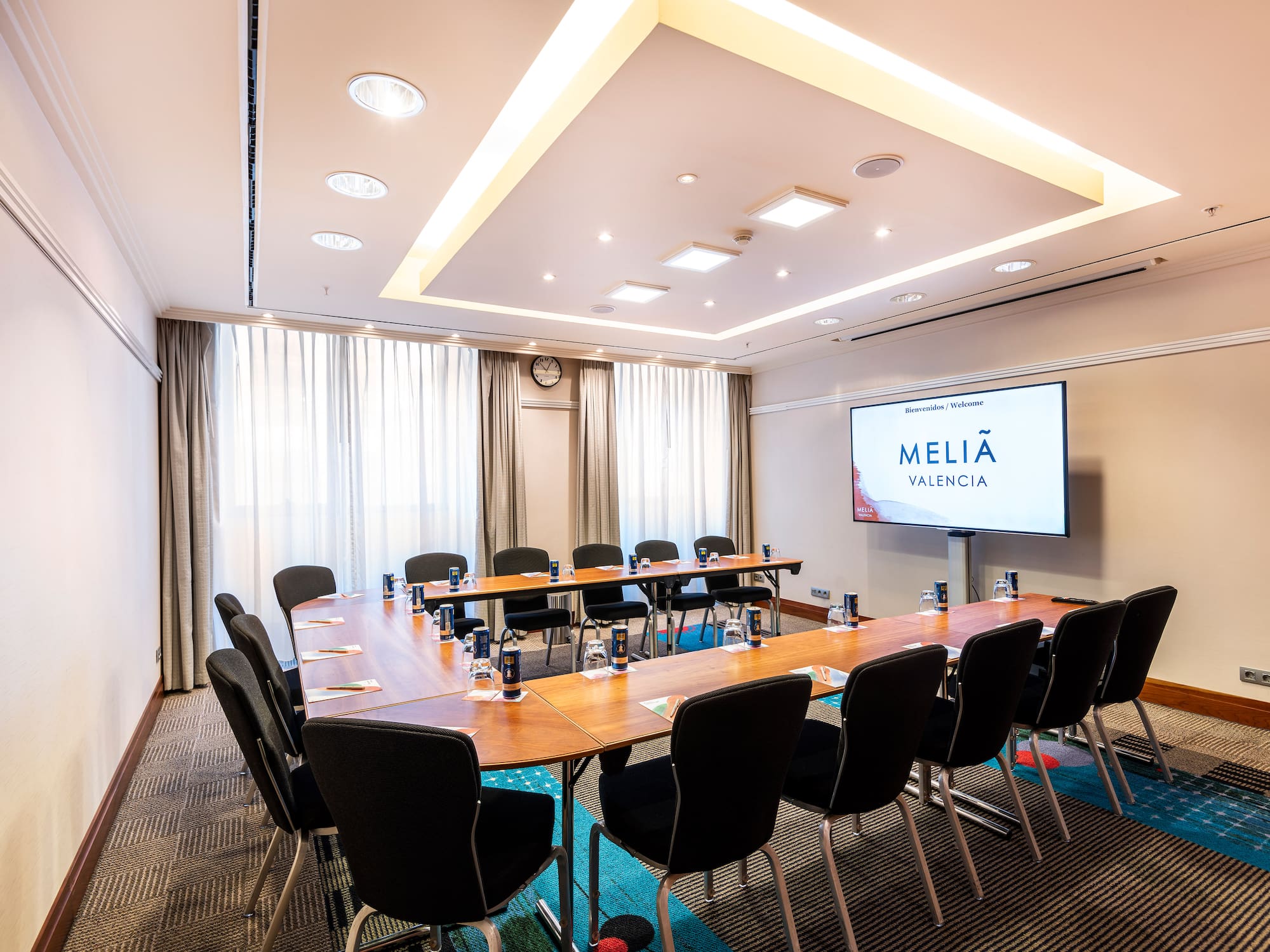 a room with a table and chairs