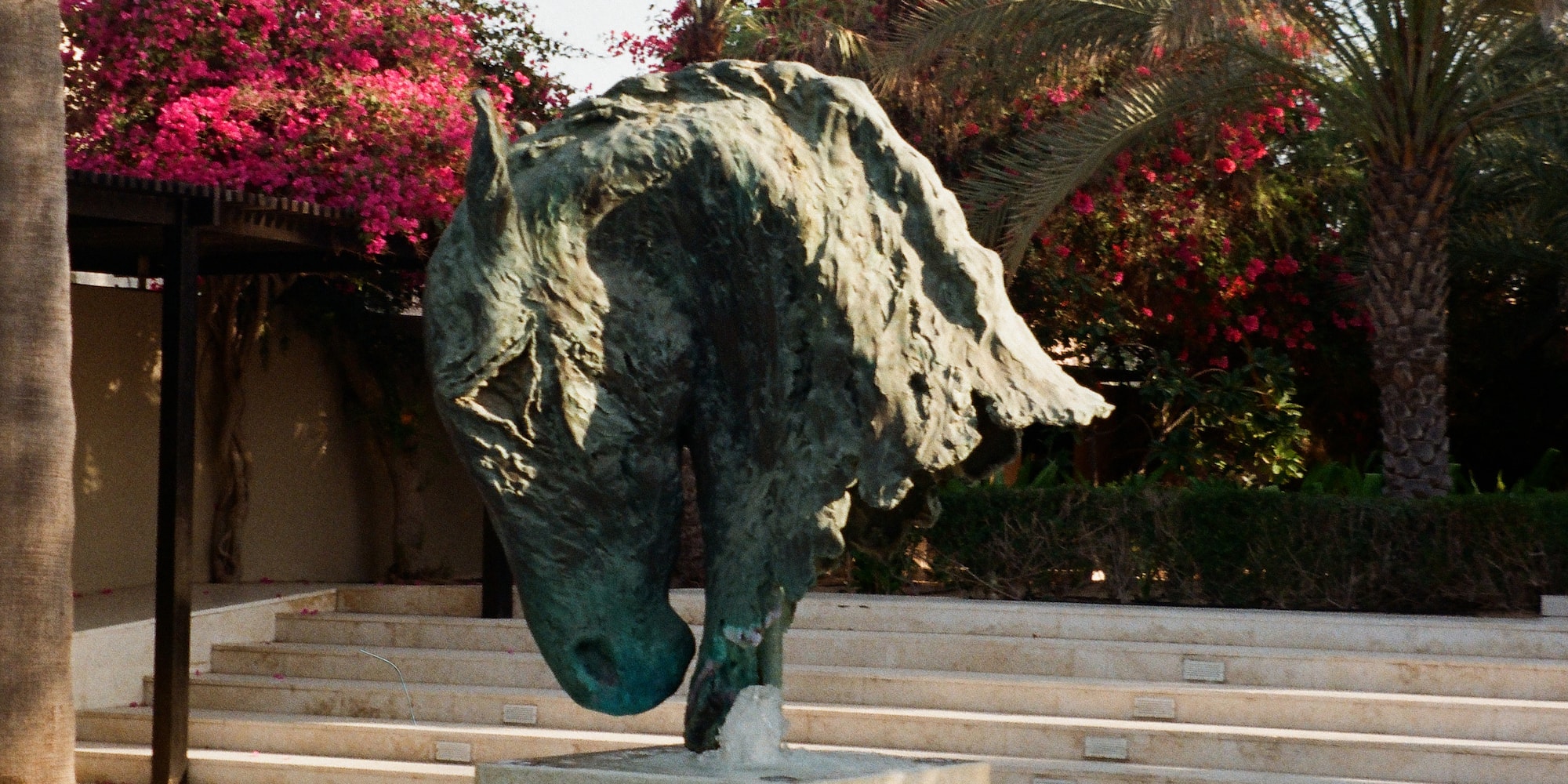a statue of a horse in a fountain