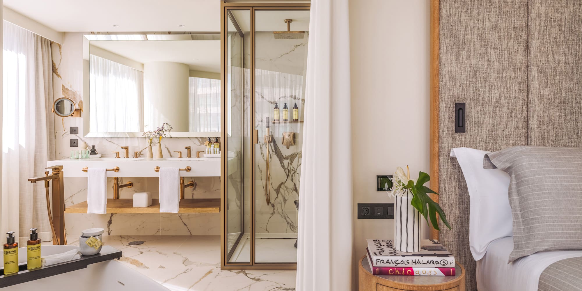 a bathroom with a bathtub and a shower