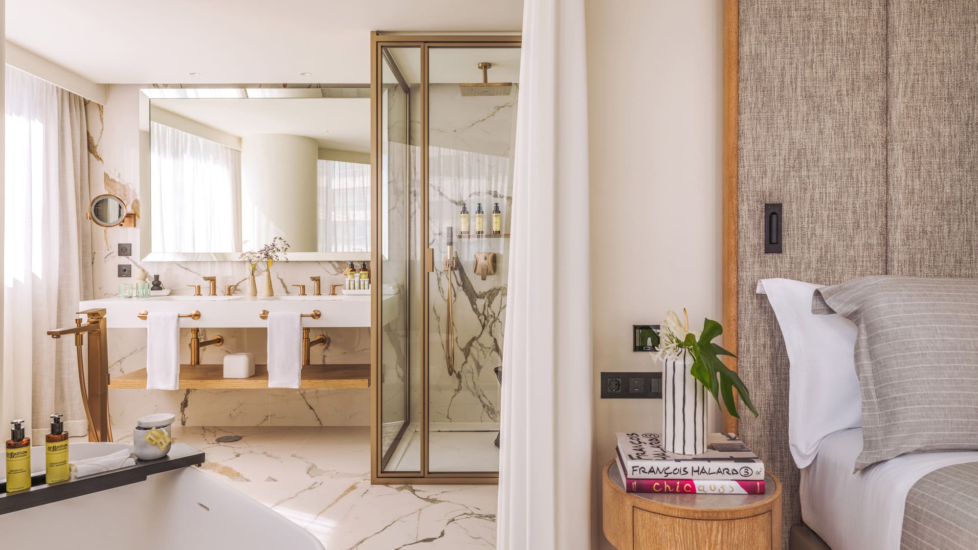 a bathroom with a bathtub and a shower