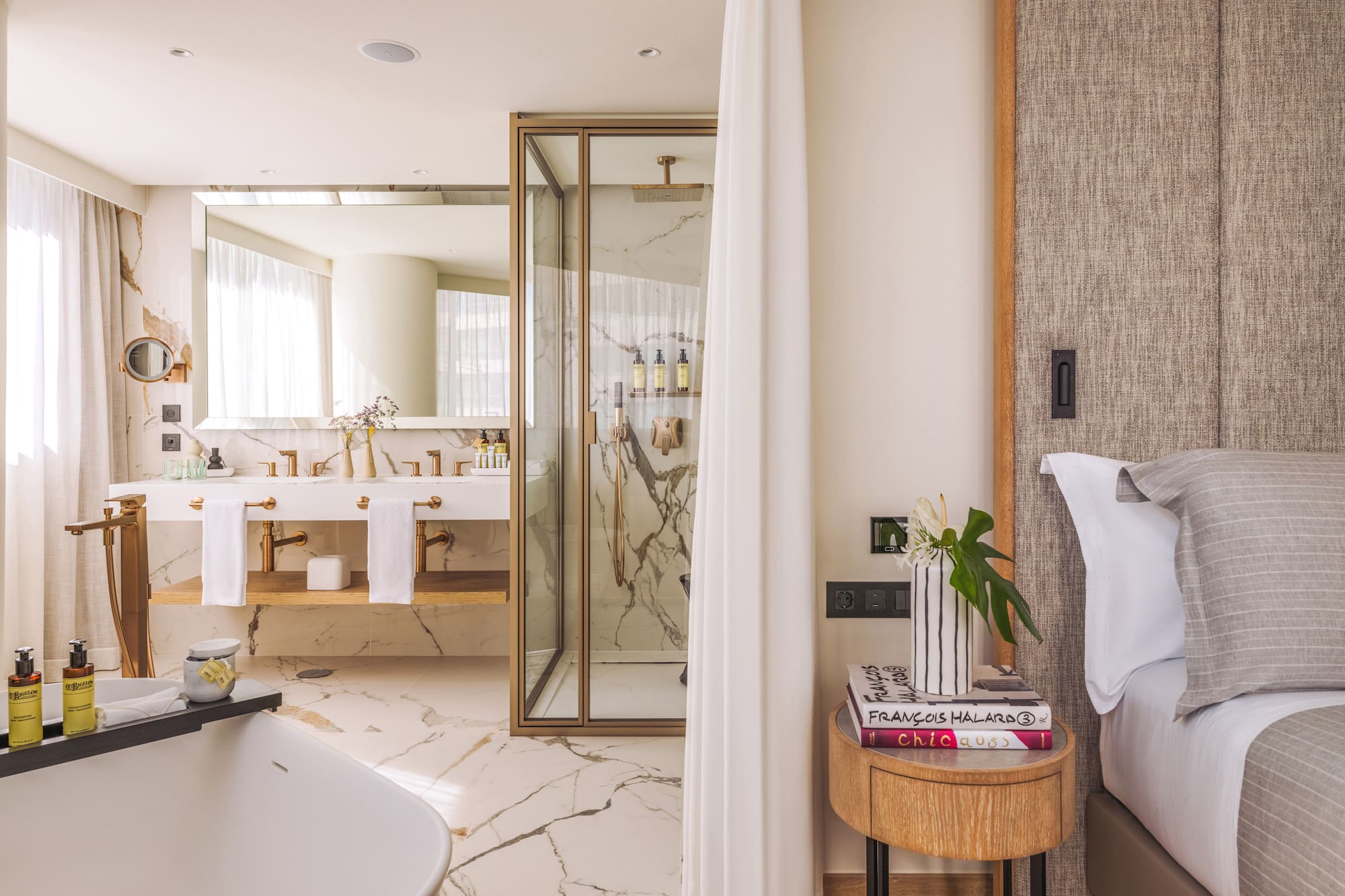 a bathroom with a bathtub and a shower