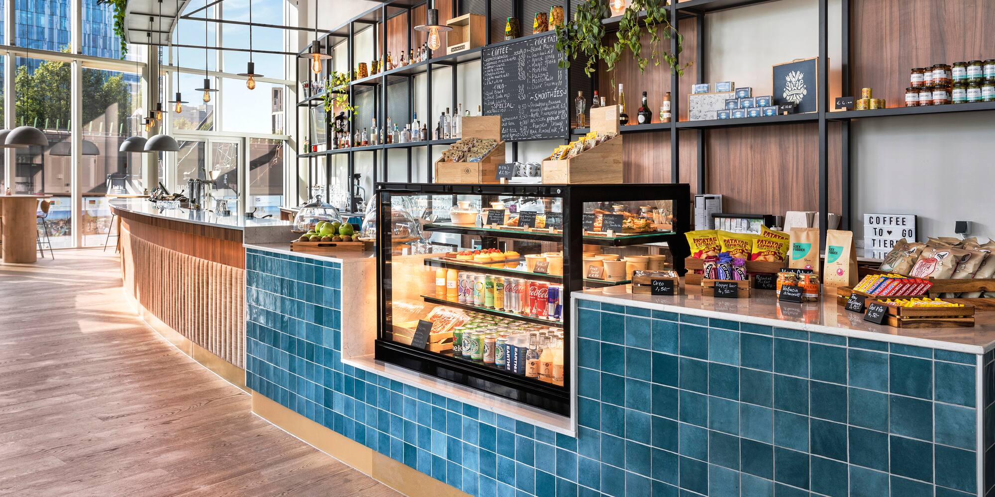 a counter with drinks and beverages on it