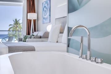 a bathtub in a hotel room