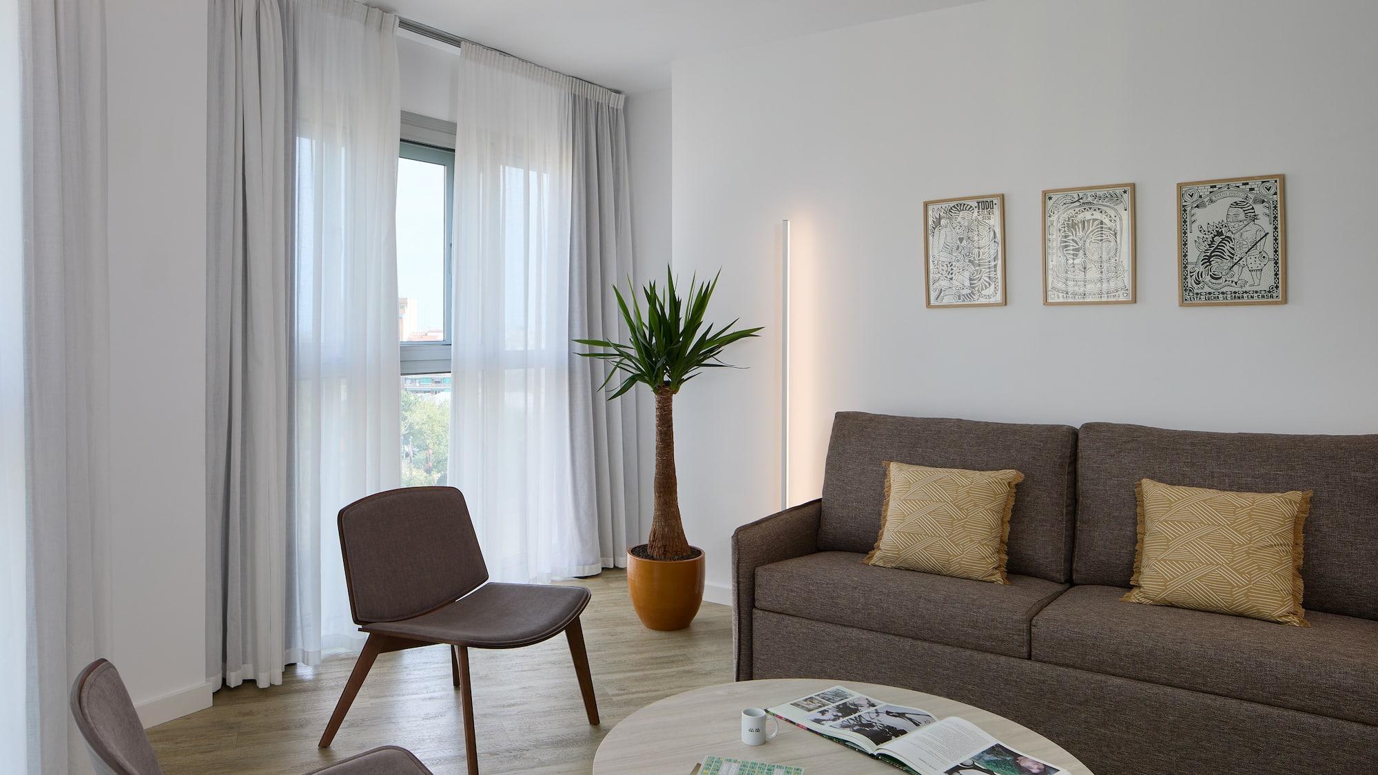 a living room with a couch and a table