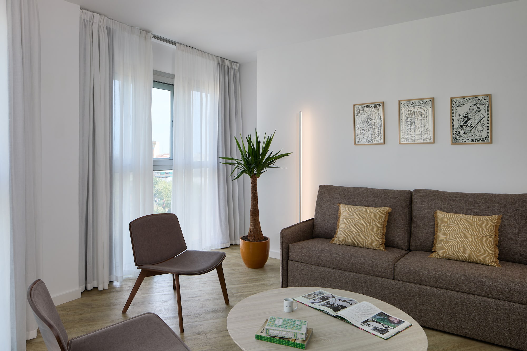 a living room with a couch and a table