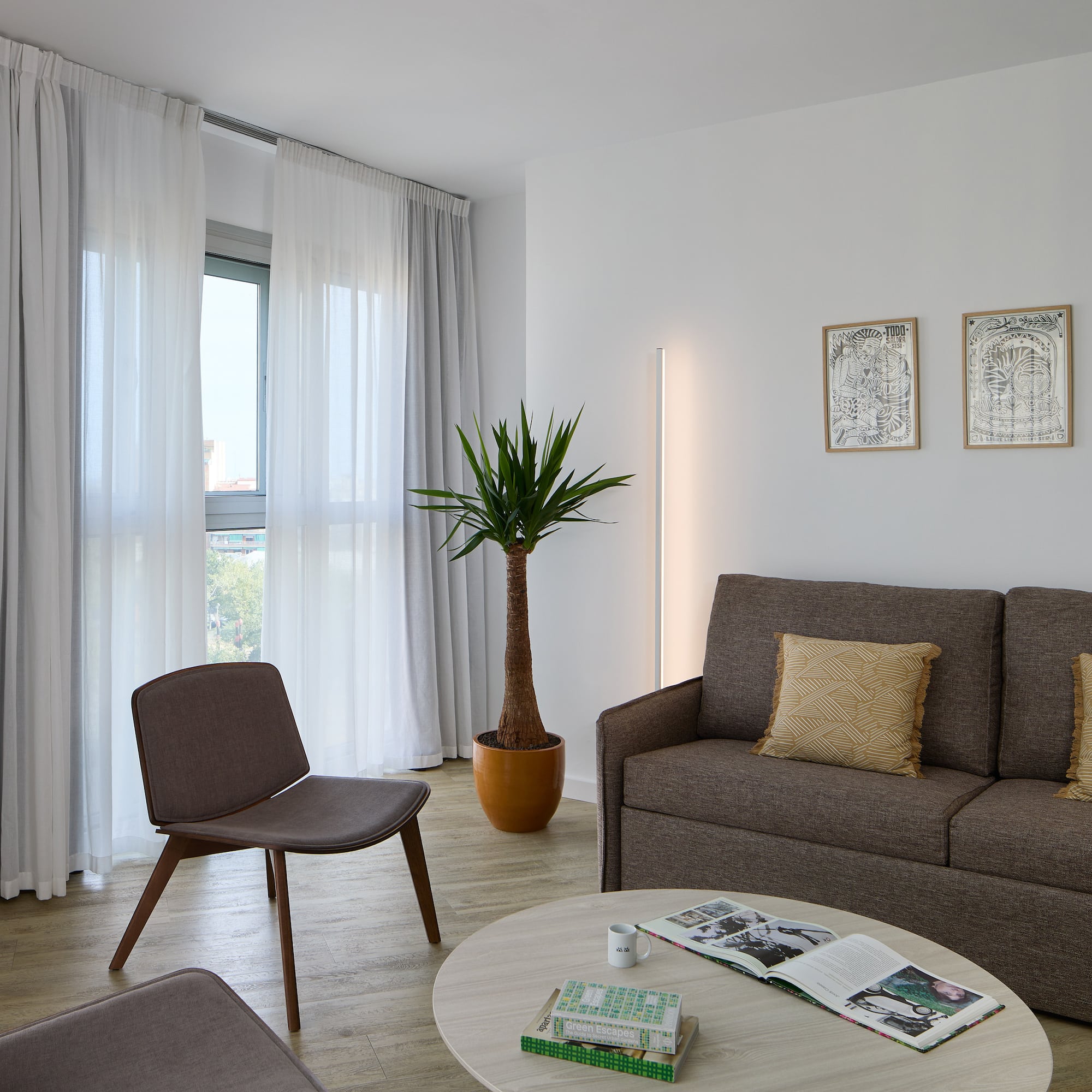 a living room with a couch and a table