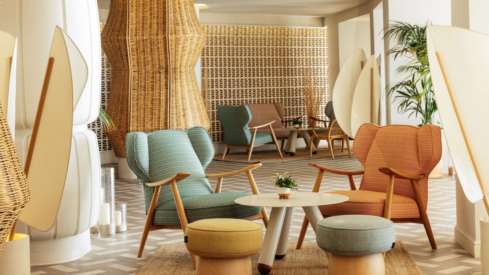 a room with wicker furniture and a table