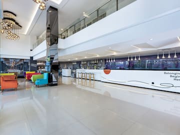 a large white room with a large white wall and a large white counter