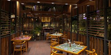 a restaurant with tables and chairs