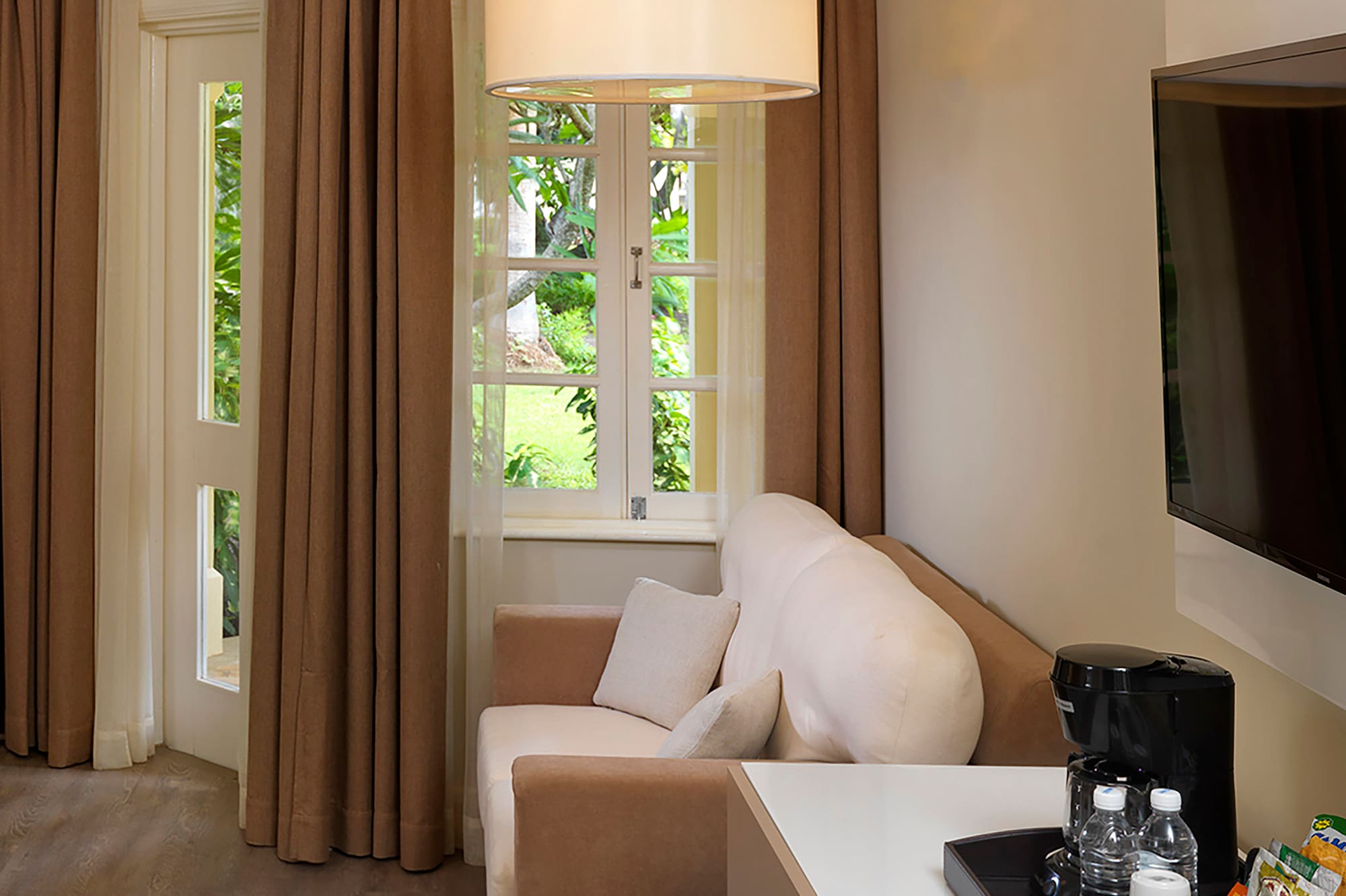 a room with a couch and a tv