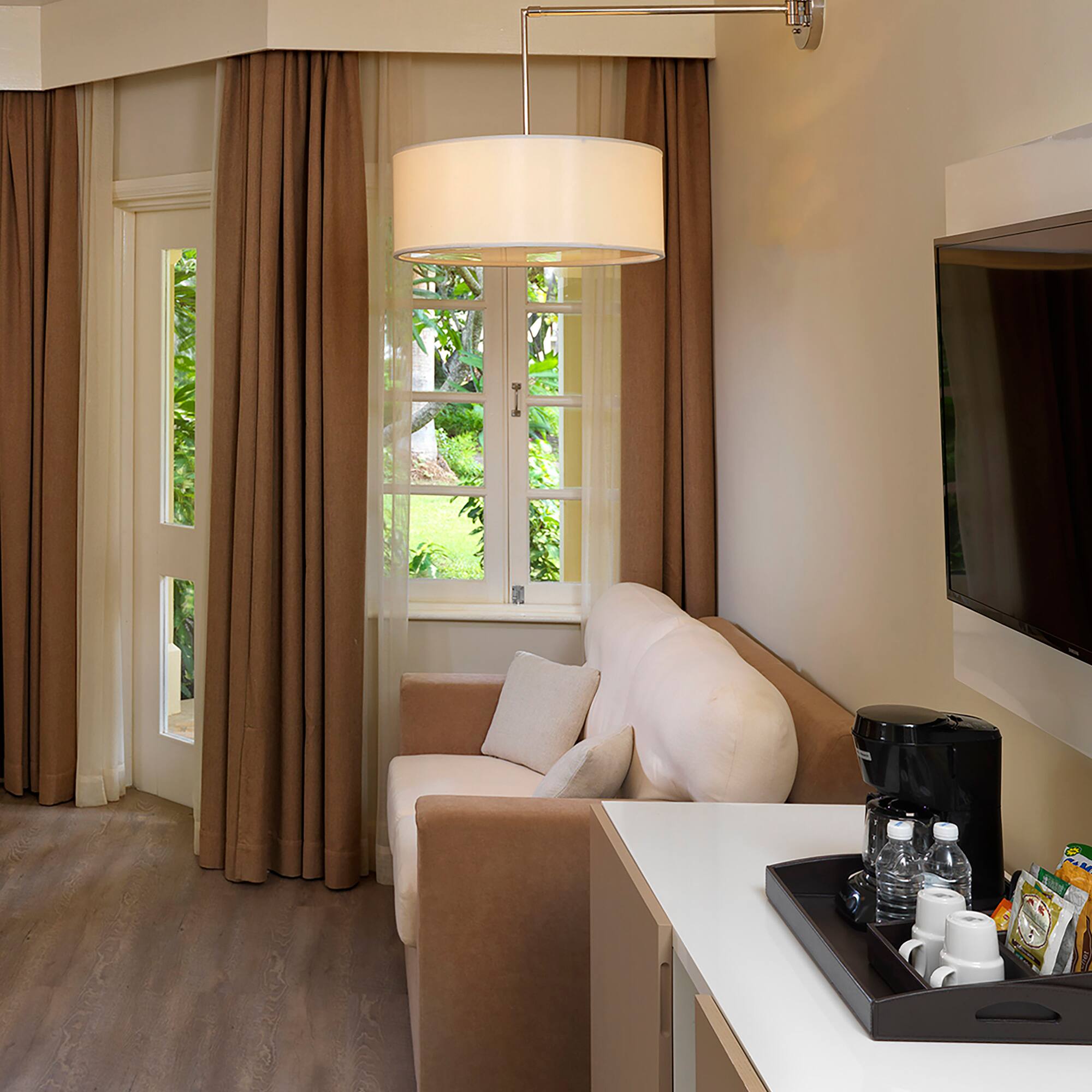 a room with a couch and a tv