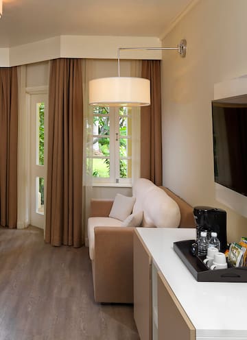 a room with a couch and a tv