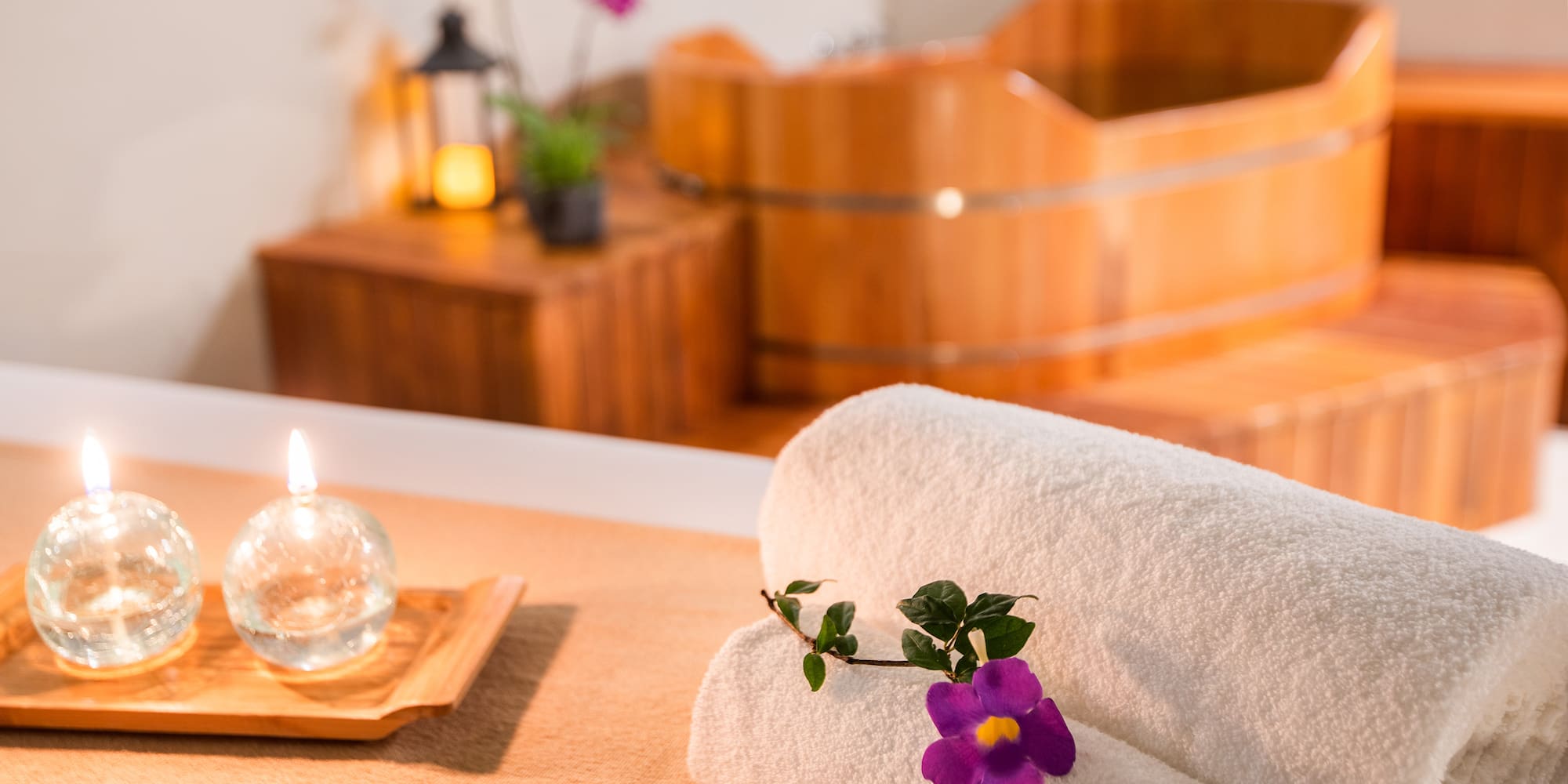 a towel and flower on a table