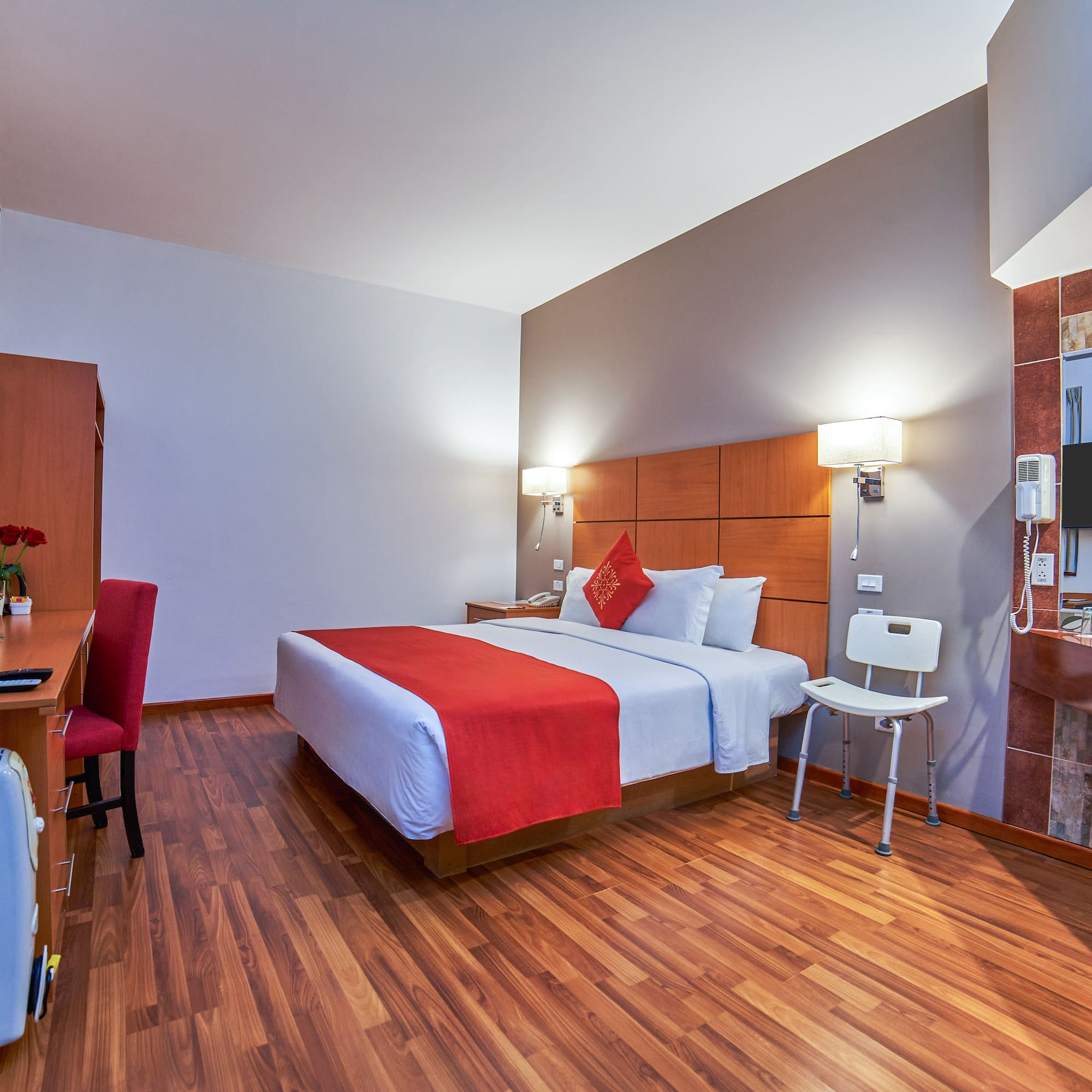 a room with a bed and a desk