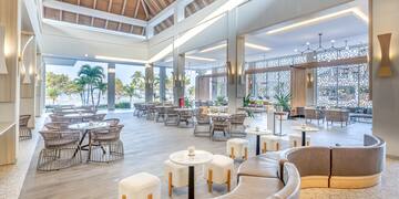 a large room with tables and chairs