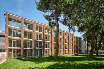 a building with trees in the background