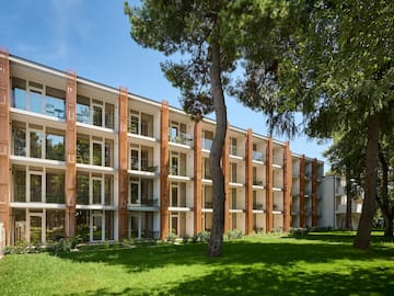 a building with trees in the background