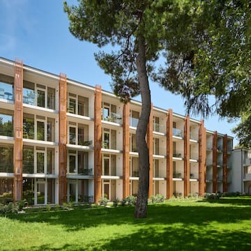 a building with trees in the background