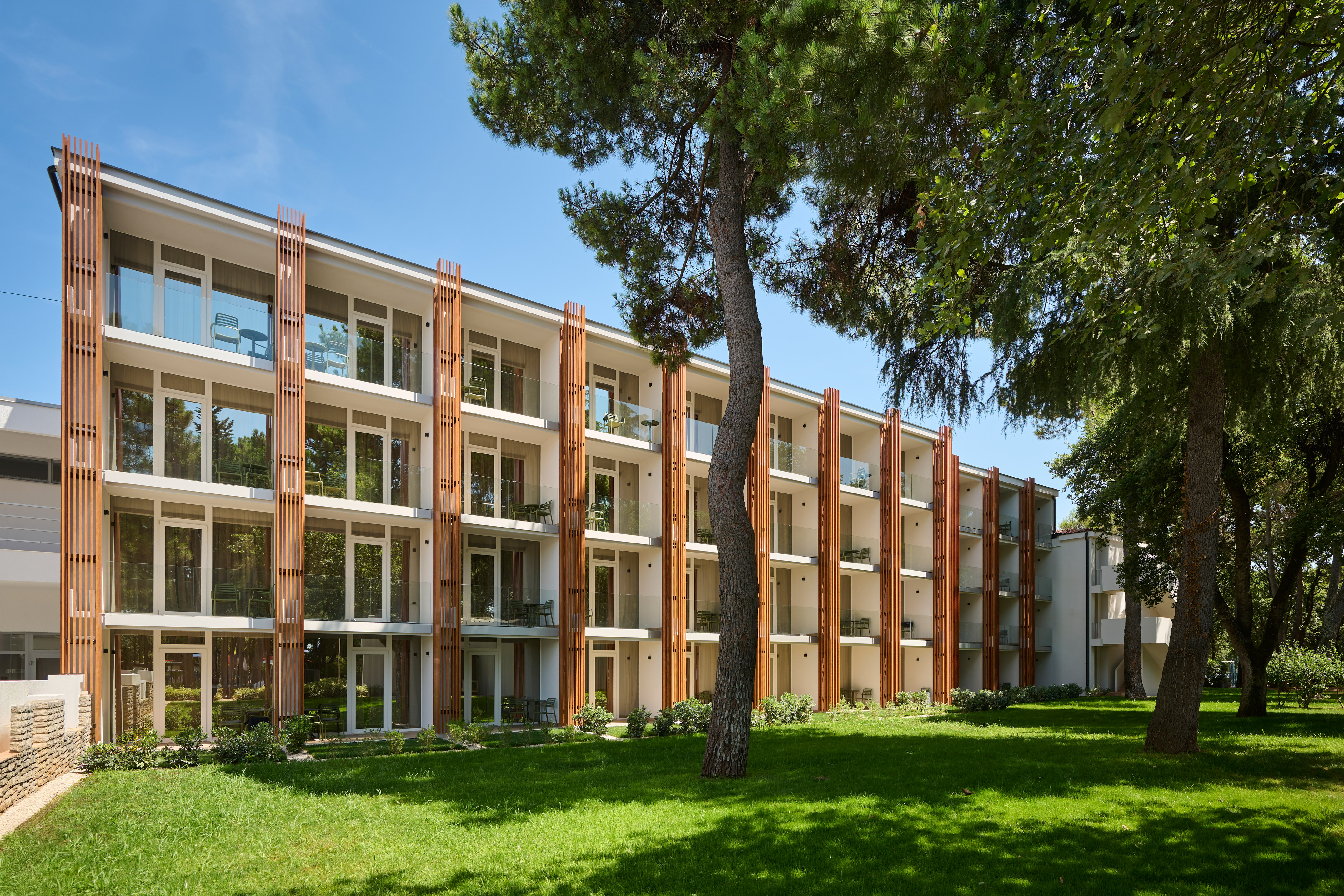 a building with trees in the background