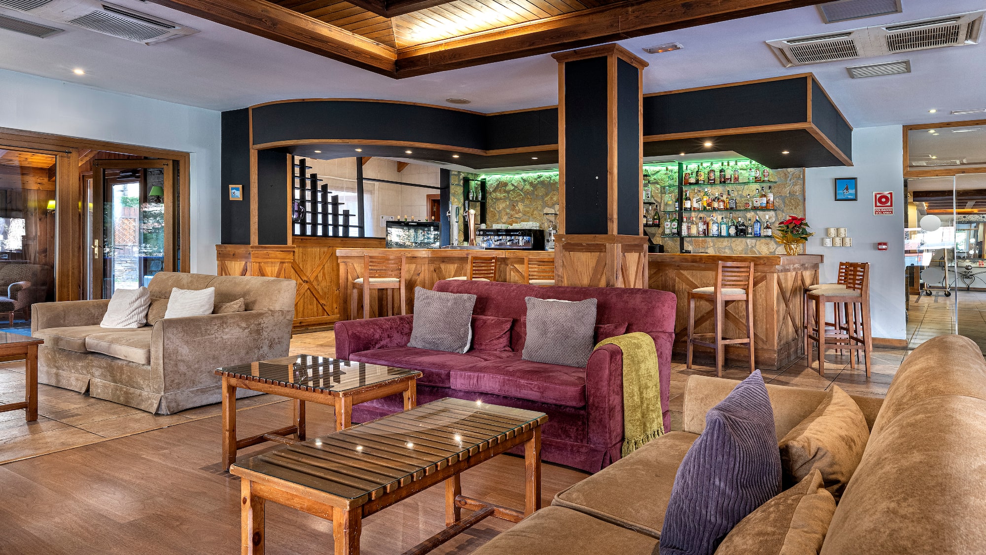 a room with a bar and a couch