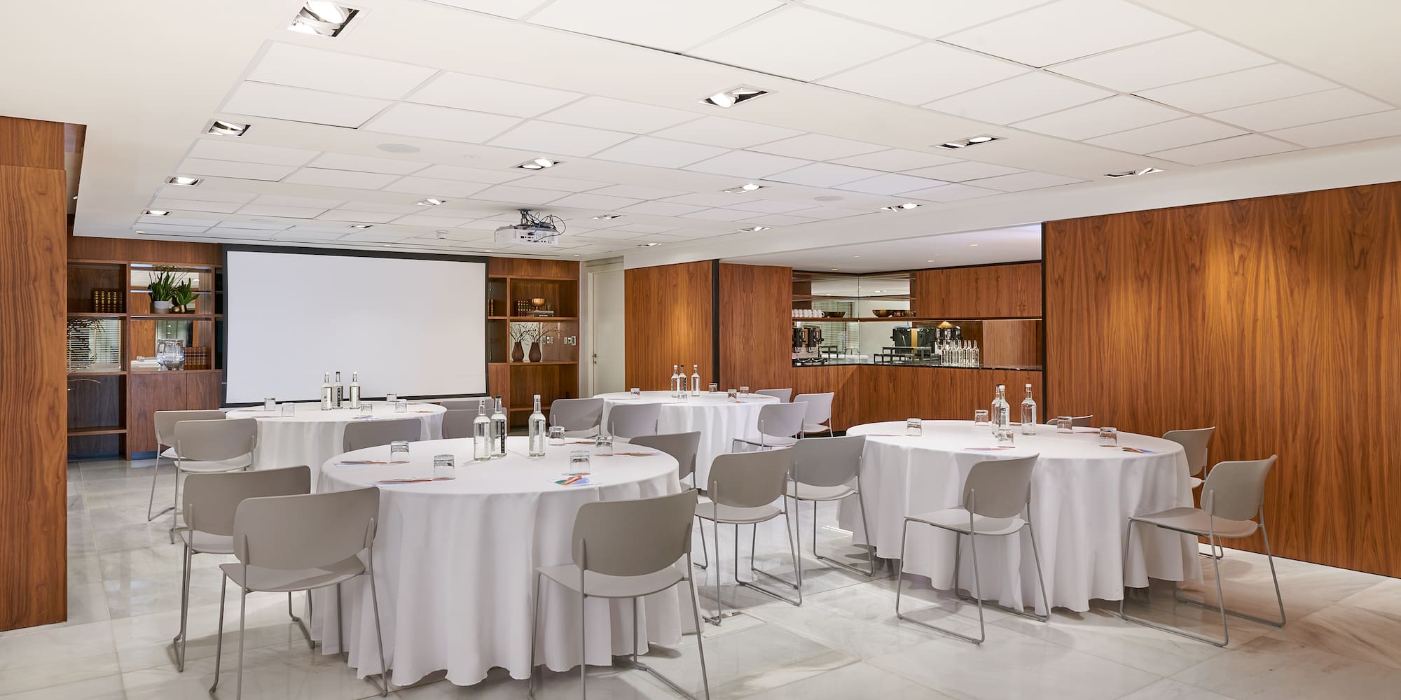 a room with tables and chairs