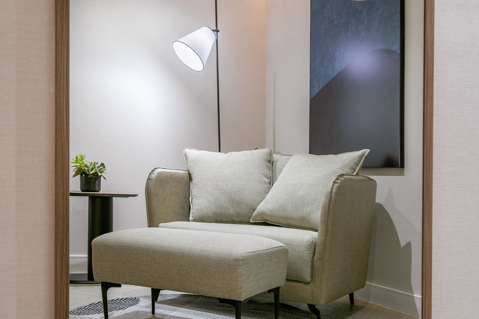 a chair and a lamp in a room