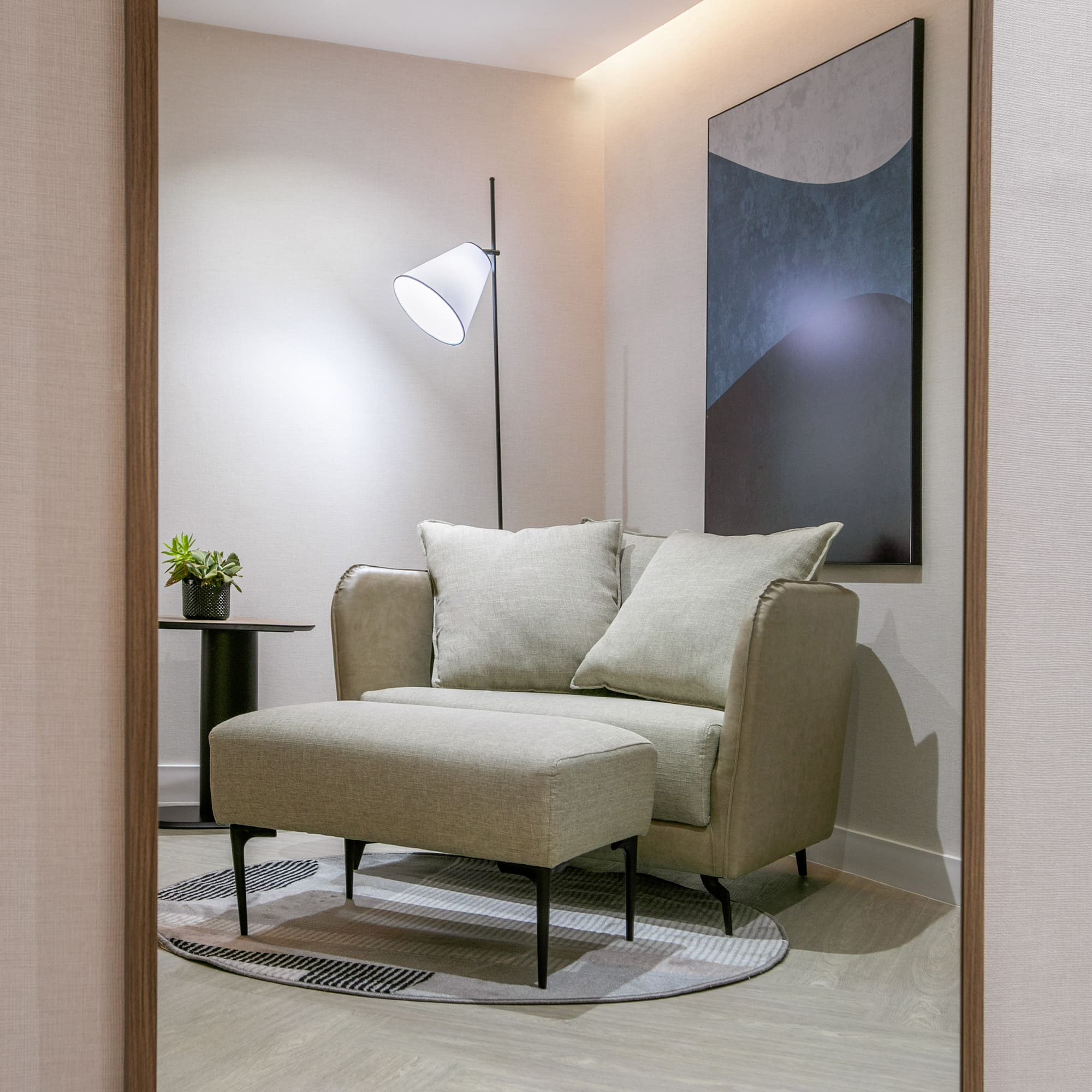 a chair and a lamp in a room