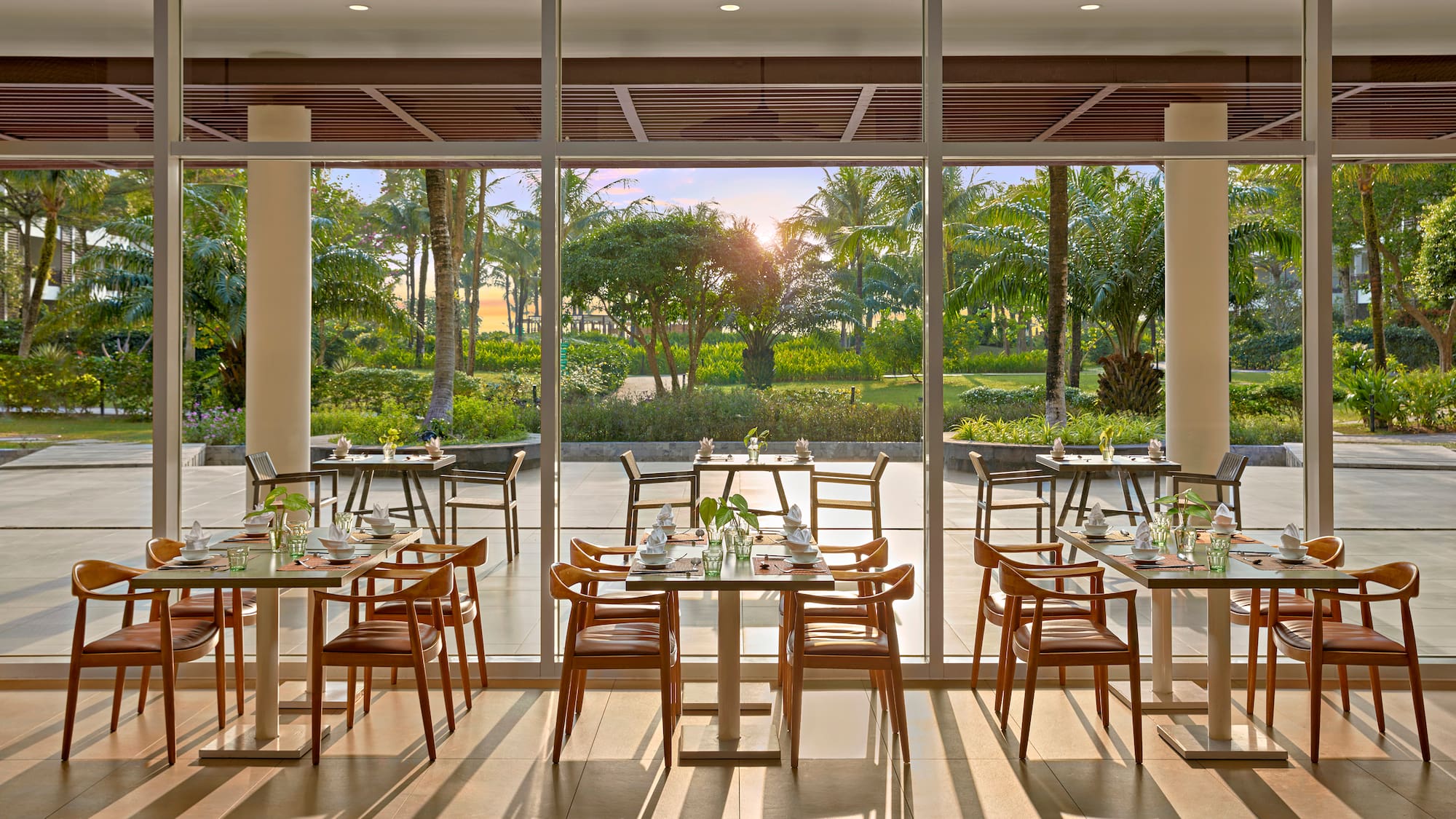 a restaurant with tables and chairs