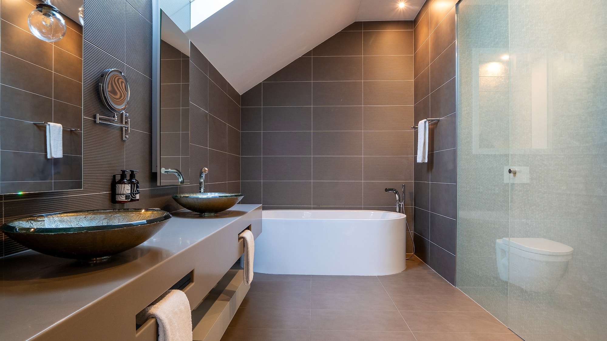 a bathroom with a shower and sink