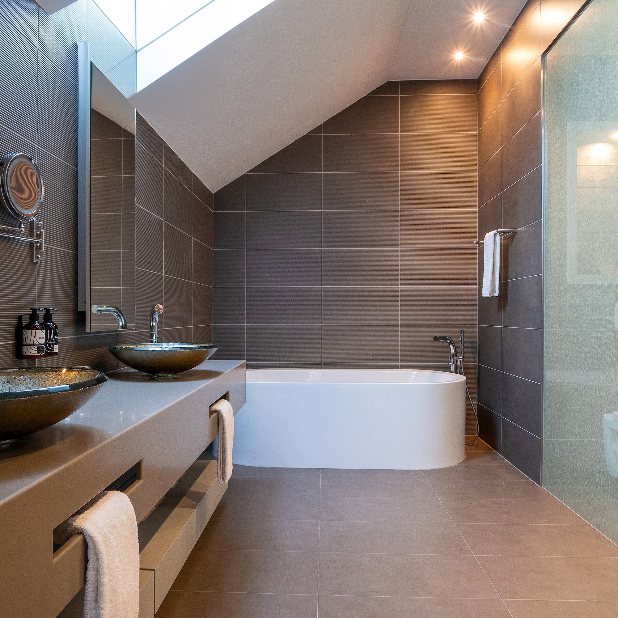 a bathroom with a shower and sink