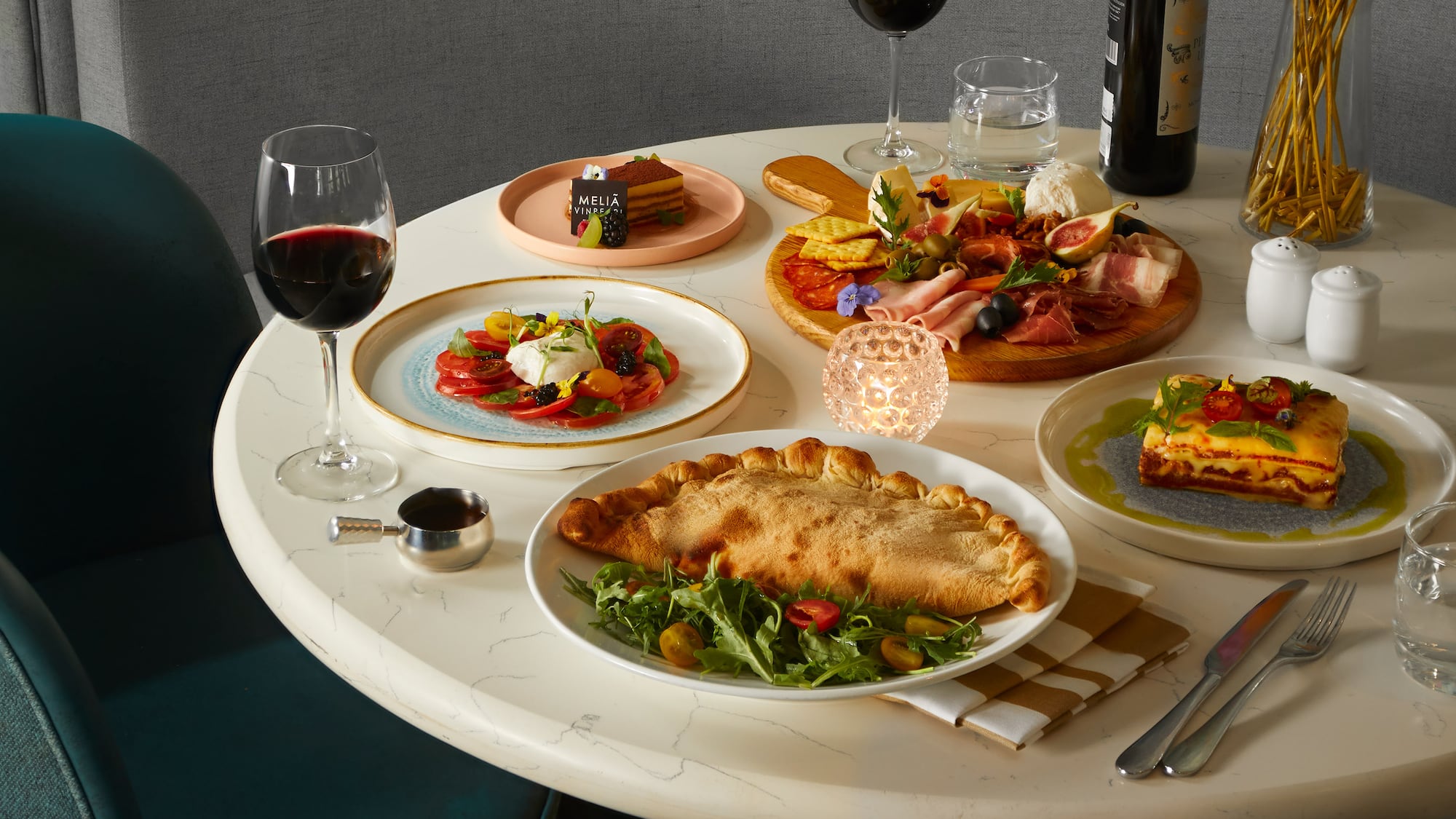 a table with food and wine on it