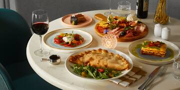 a table with food and wine on it