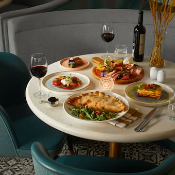 a table with food and wine on it