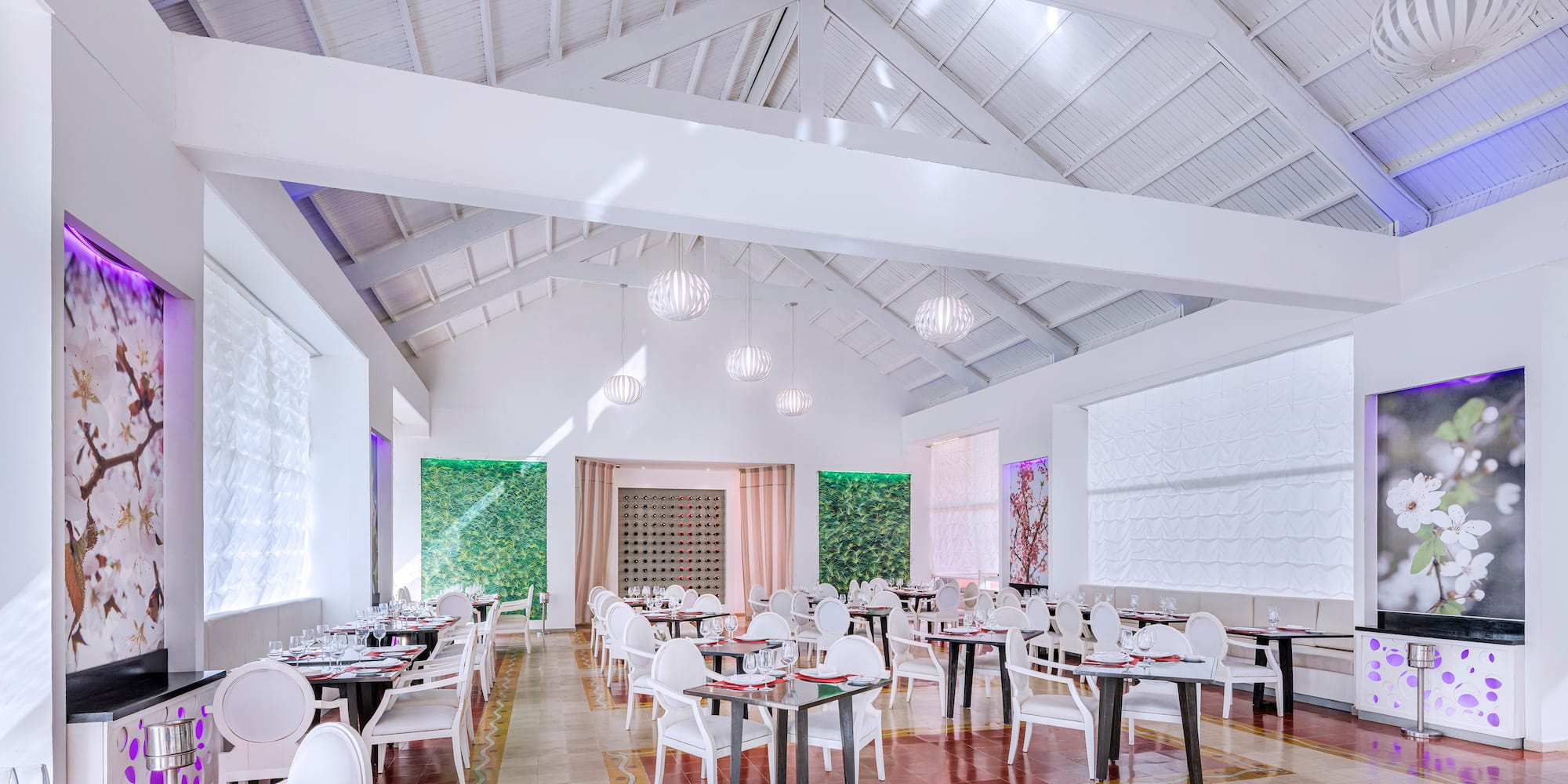 a room with tables and chairs