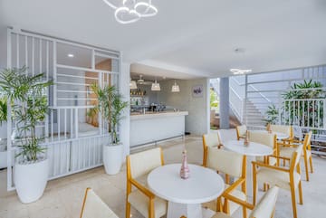 a room with tables and chairs