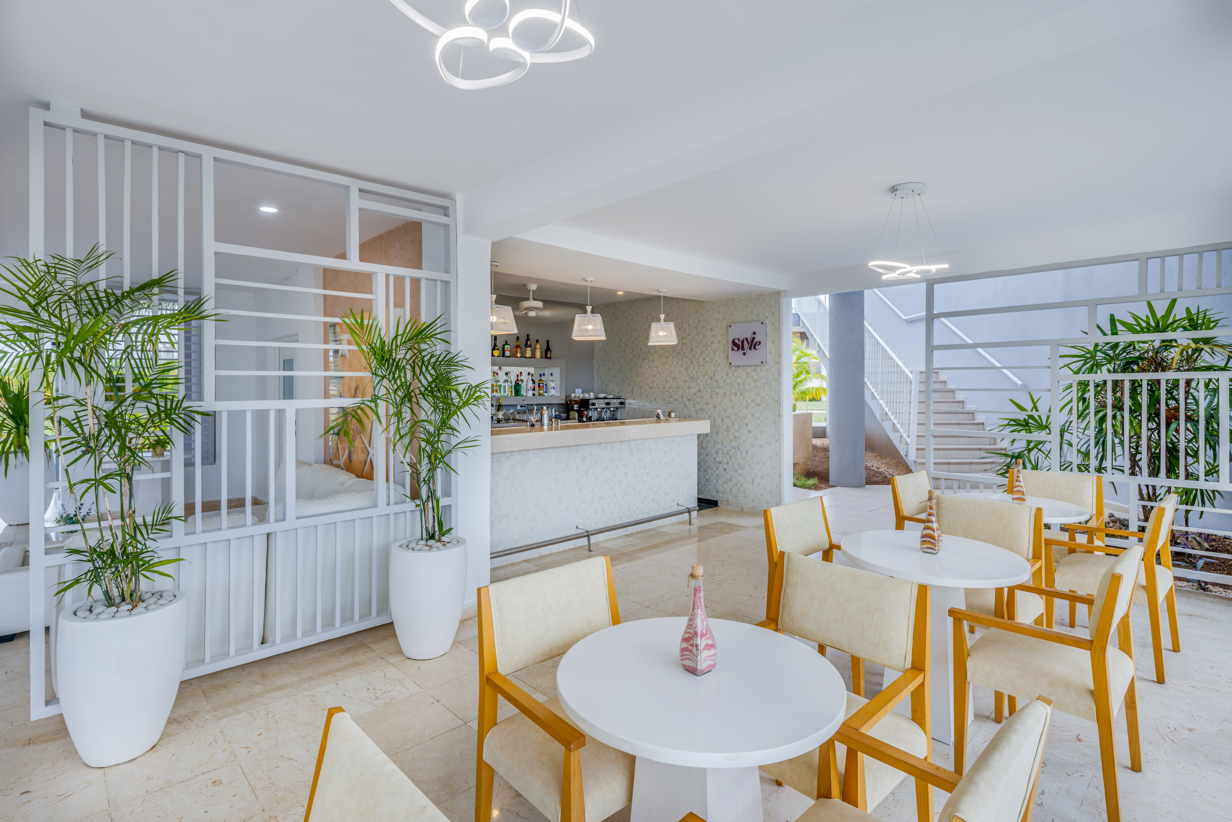 a room with tables and chairs