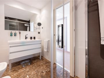 a bathroom with a glass door