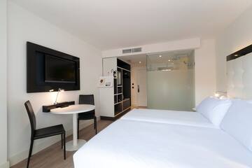 a room with a bed and a table