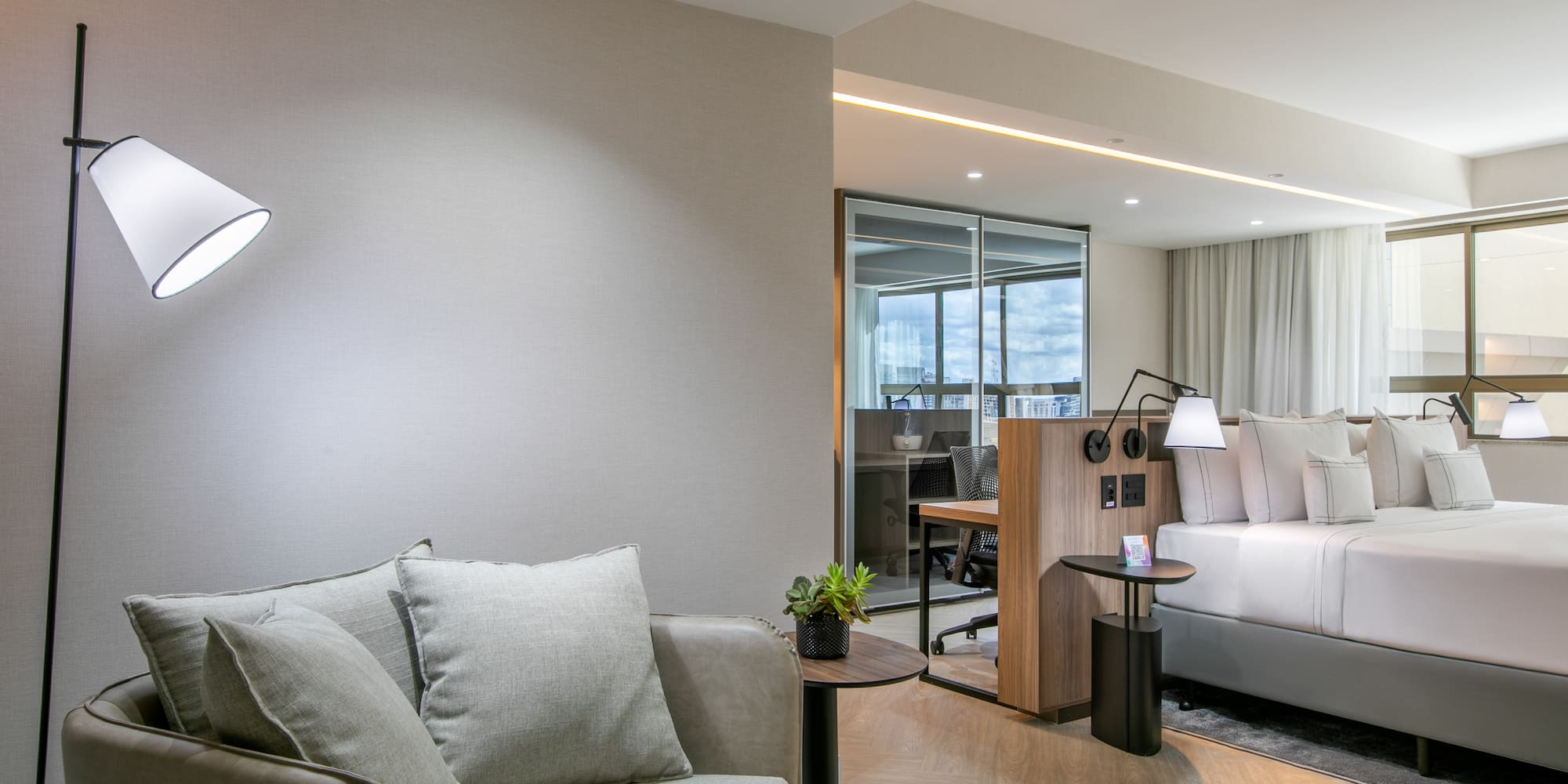 a room with a couch and a bed