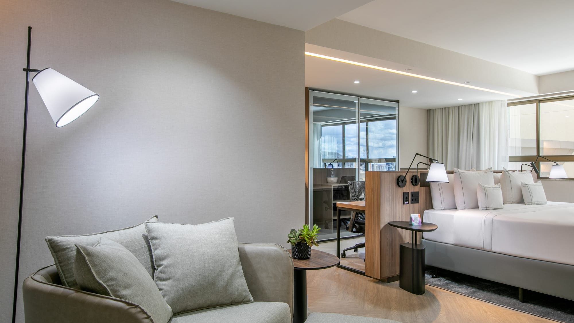 a room with a couch and a bed