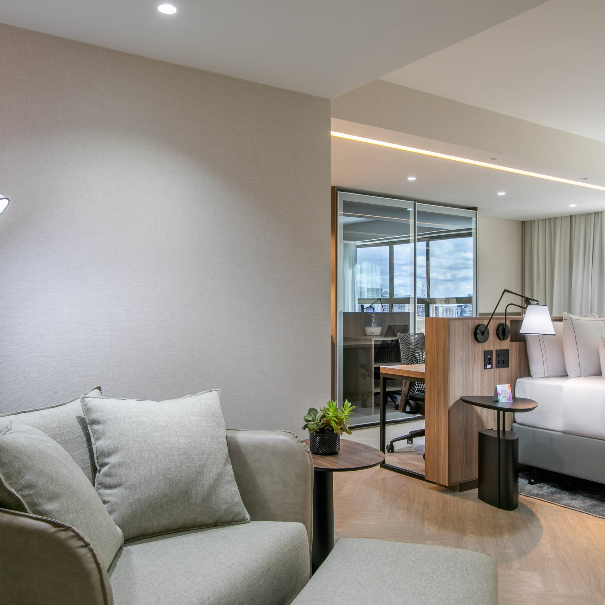 a room with a couch and a bed