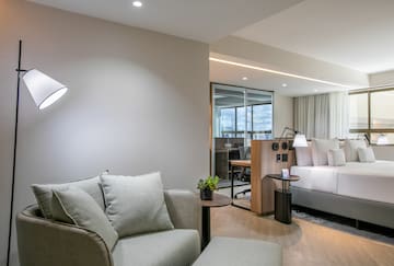 a room with a couch and a bed