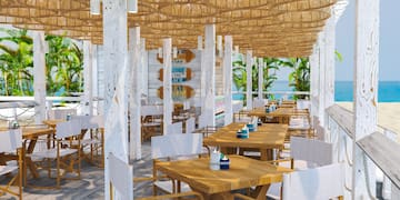 a restaurant with tables and chairs