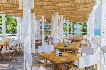 a restaurant with tables and chairs