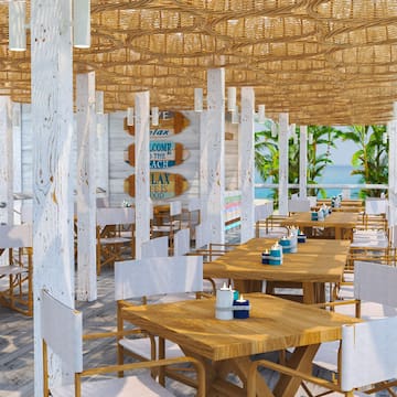 a restaurant with tables and chairs