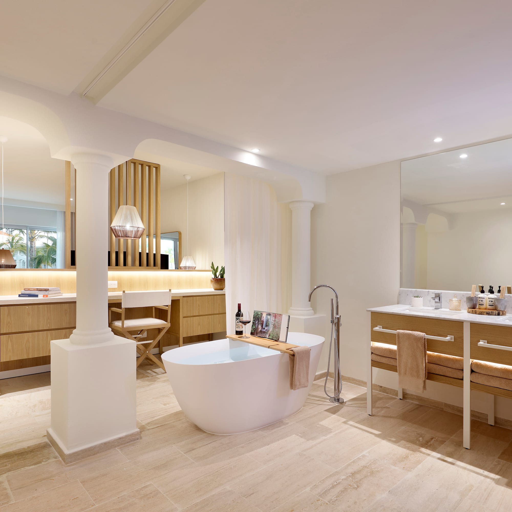 a bathroom with a tub and a sink