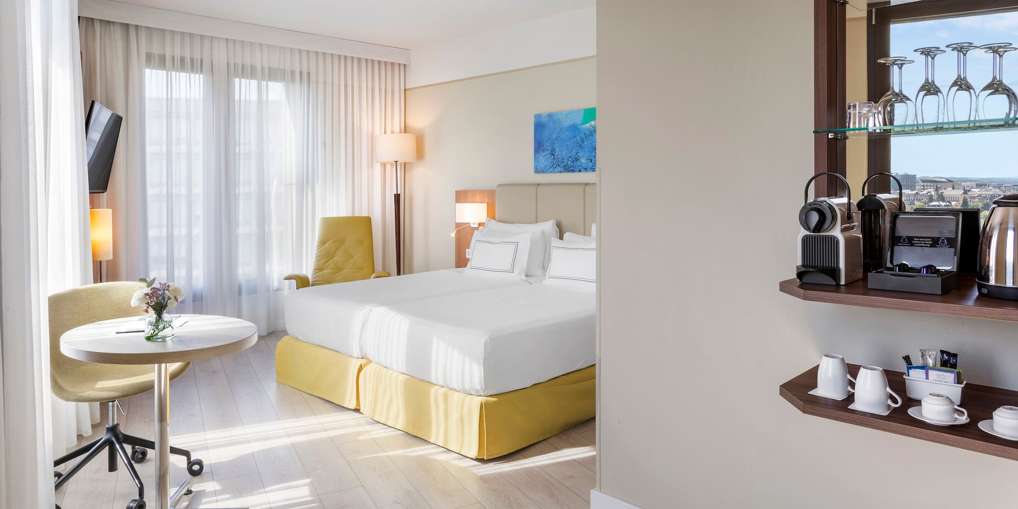 a room with a bed and a desk